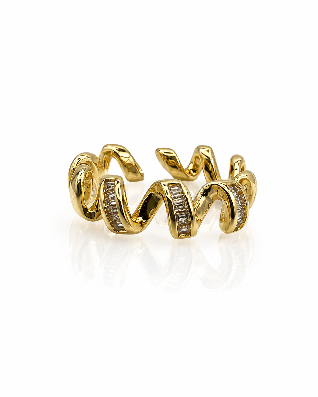 Bague Onda dorée ruban sinueux zircons taille baguette