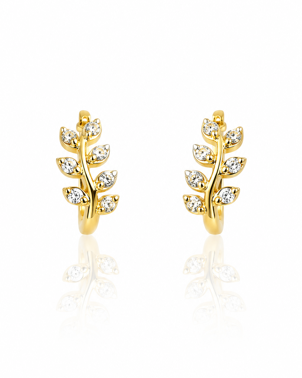 Boucles d'oreilles dorées branche feuilles zircons